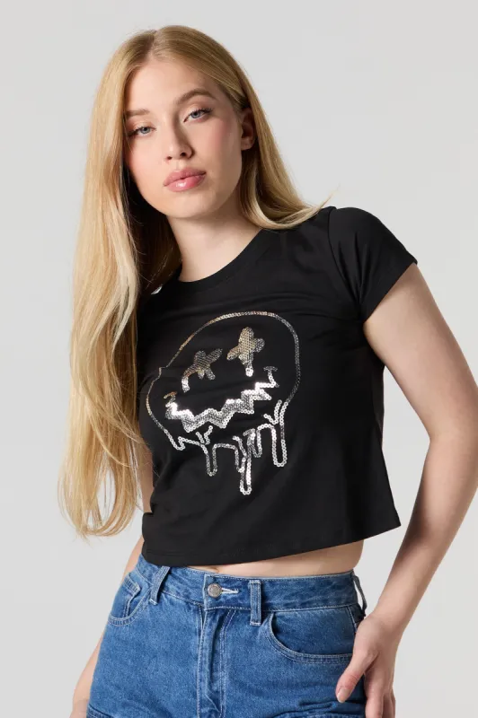 T-shirt ultracourt à imprimé Smiley avec paillettes sold by Urban Planet