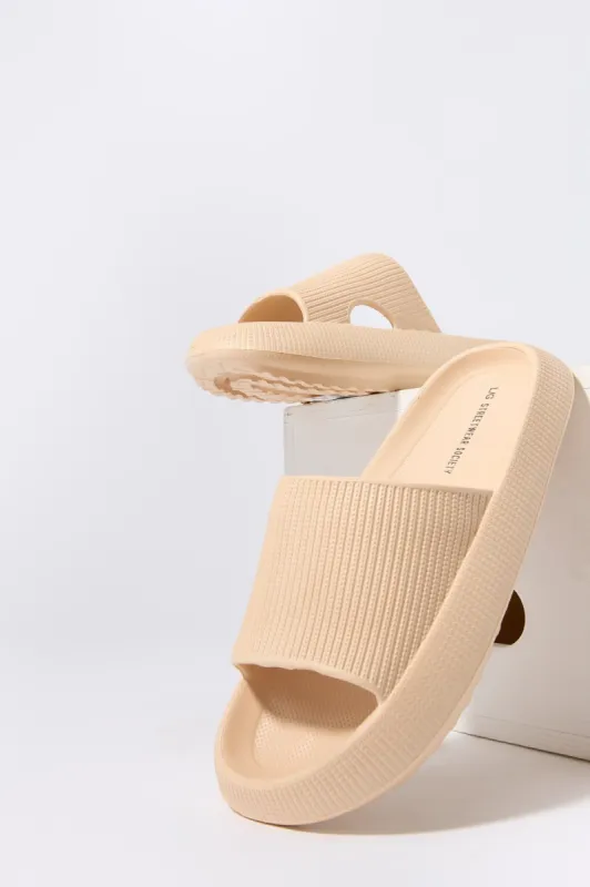 Mules pelucheuses sold by Urban Planet