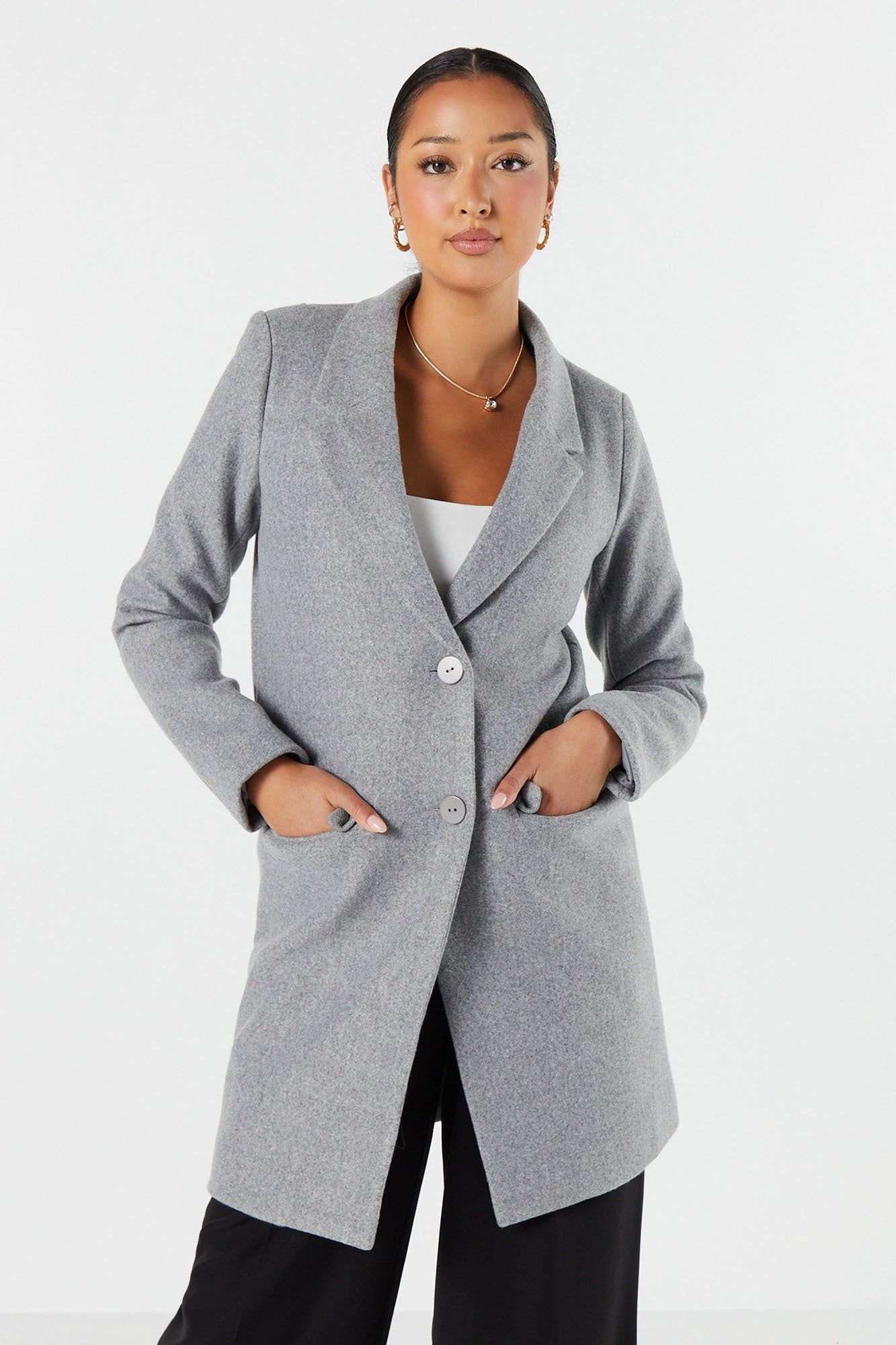 Par-dessus droit en laine sold by Urban Planet