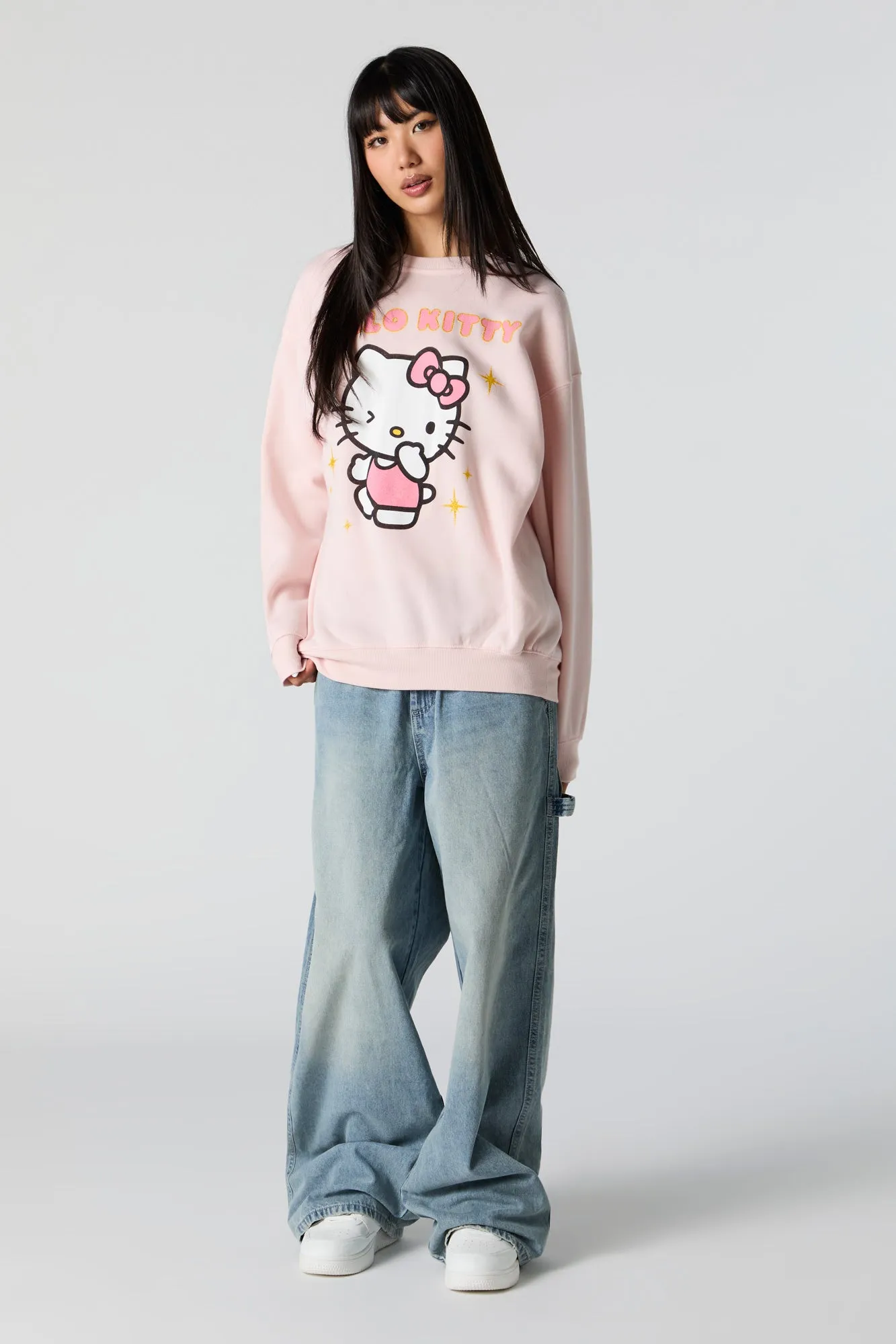 Pink Hello Kitty Graphic Sweatshirt sold by Urban Planet product image thumbnail 3