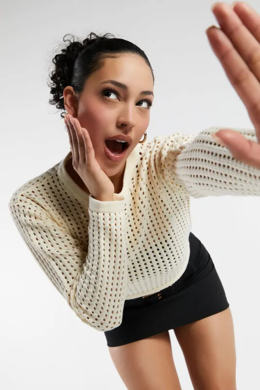 Fishnet Long Sleeve Crop Top sold by Urban Planet