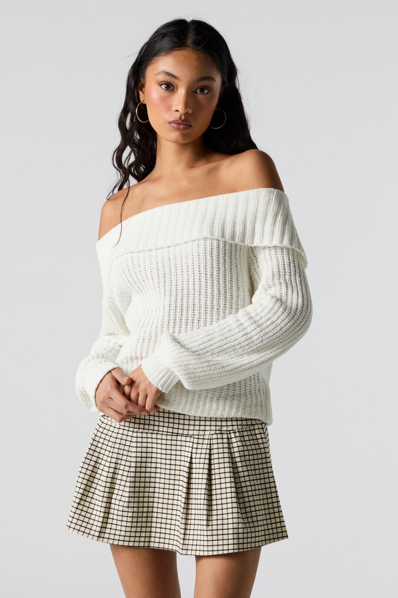 Jupe plissée à carreaux havane sold by Urban Planet