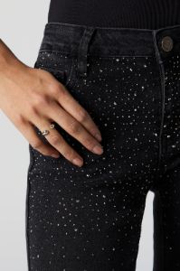Jean à jambe évasée délavé noir avec pierres du Rhin sold by Urban Planet