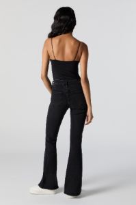 Jean à jambe évasée délavé noir avec pierres du Rhin sold by Urban Planet