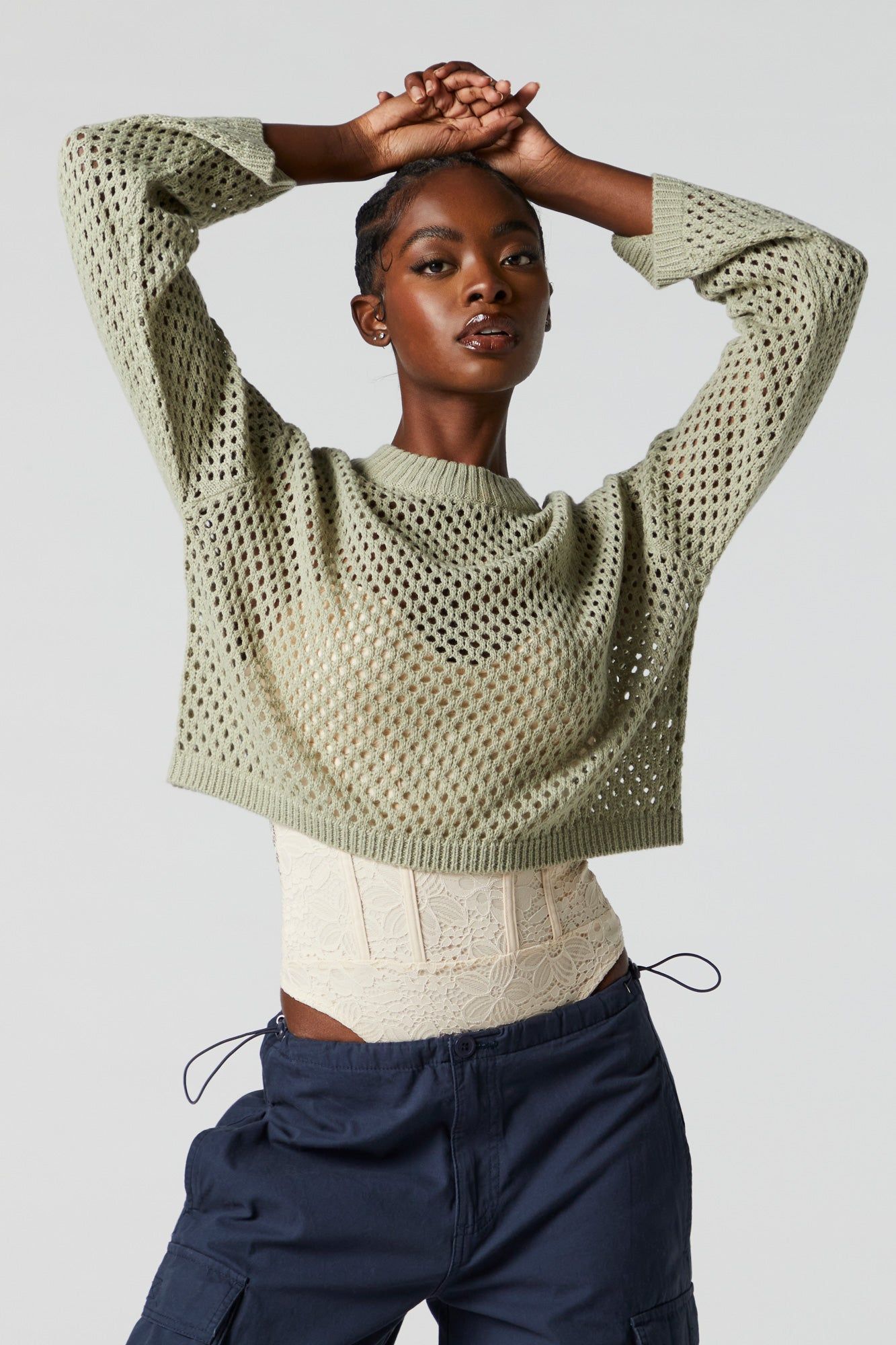 Chandail en tricot ajouré sold by Urban Planet