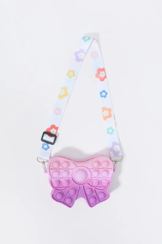 Girls Poppable Bow Crossbody Purse sold by Urban Planet