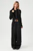 Chandail-cardigan long en similifourrure sold by Urban Planet
