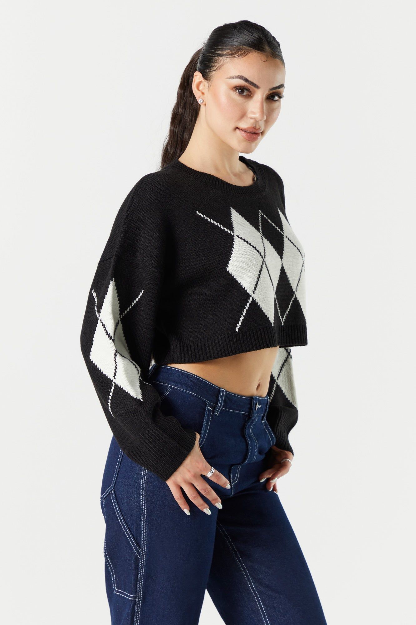 Black Cropped Argyle Sweater sold by Urban Planet