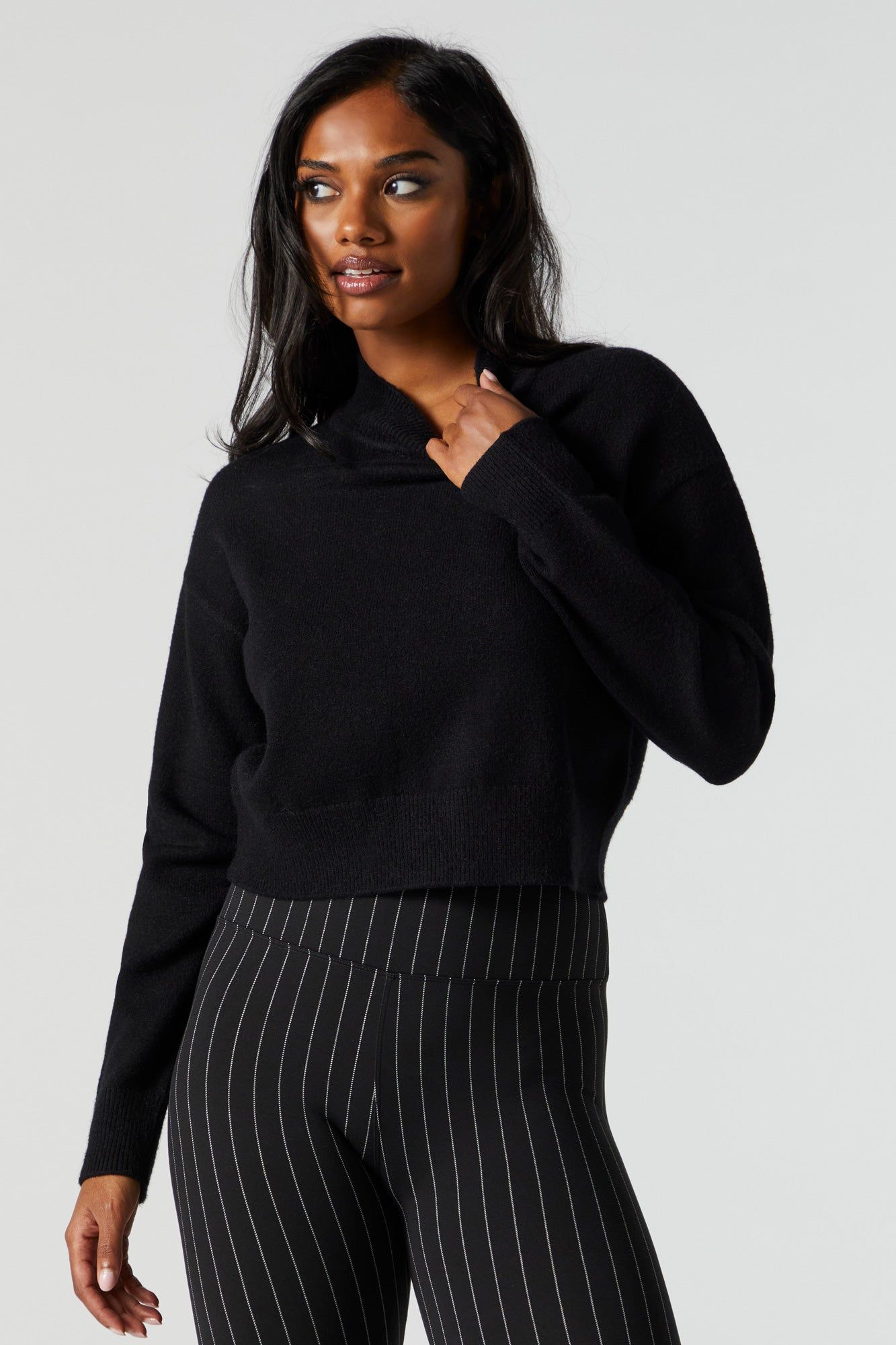 Solid Knit Mock Neck Sweater sold by Urban Planet