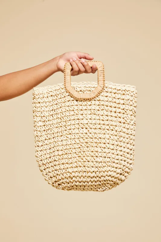 Pochette en paille tissée sold by Urban Planet