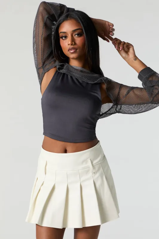 Jupe-short plissée en similicuir sold by Urban Planet