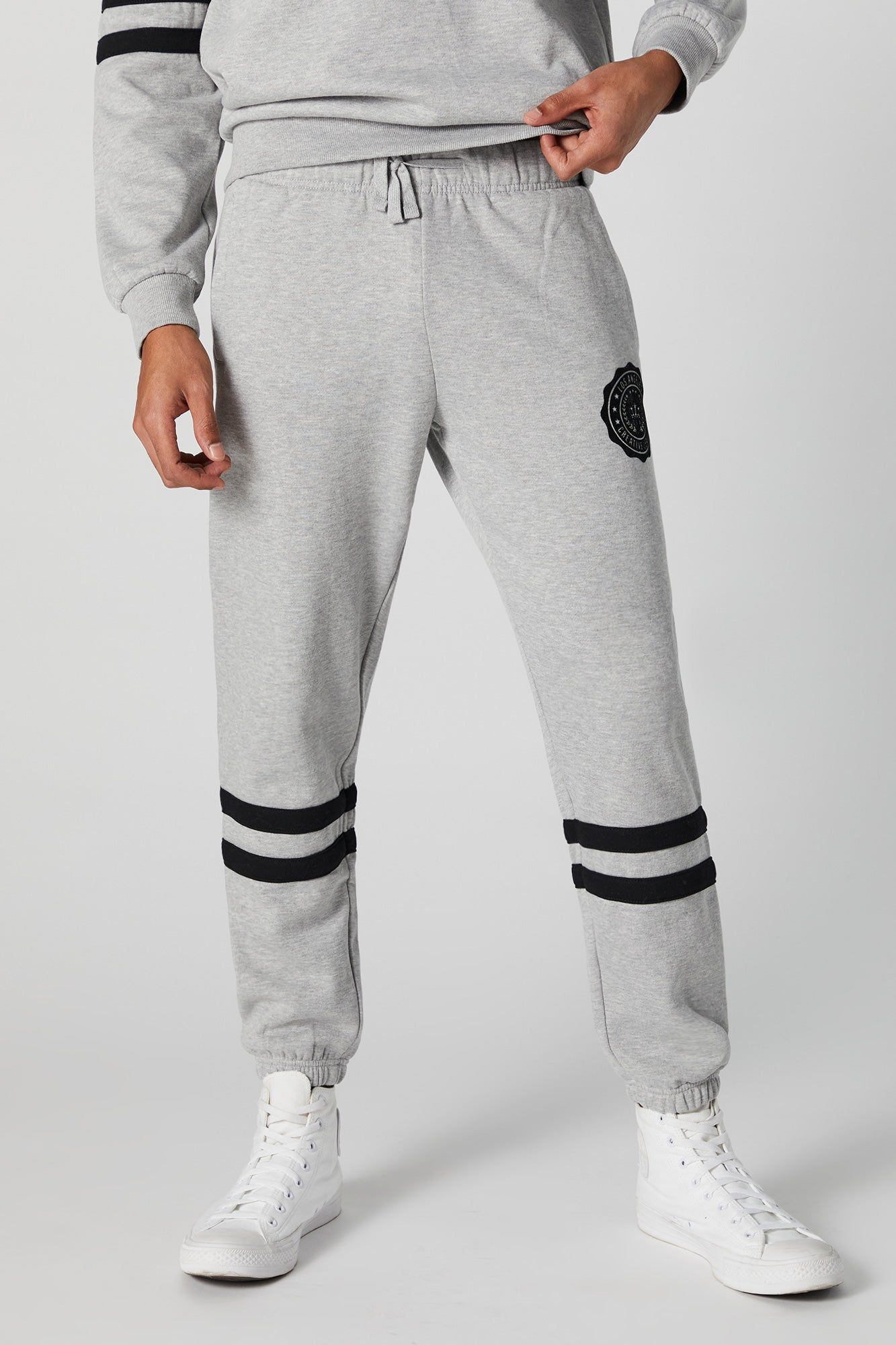 Los Angeles Graphic Fleece Varsity Jogger sold by Urban Planet