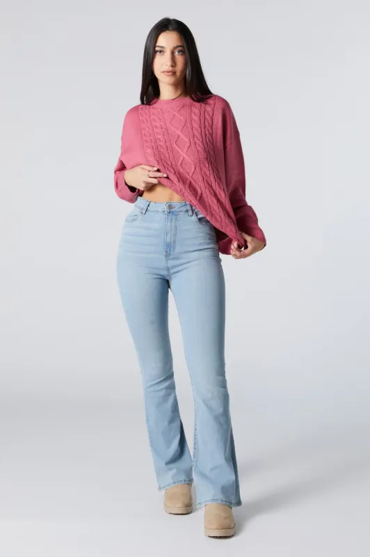 Jean à jambe évasée délavé pâle à taille haute sold by Urban Planet