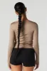 Haut profilé cintré asymétrique à manches longues sold by Urban Planet