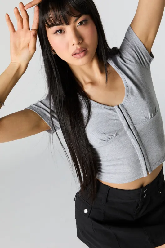 T-shirt avec agrafes et encolure en V sold by Urban Planet