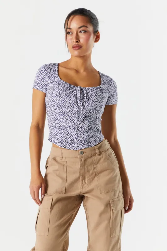 Haut corset fleuri à manches courtes sold by Urban Planet