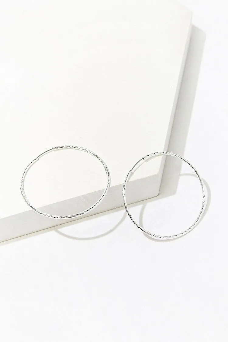 Twisted Hoop Earrings sold by Urban Planet product image thumbnail 5