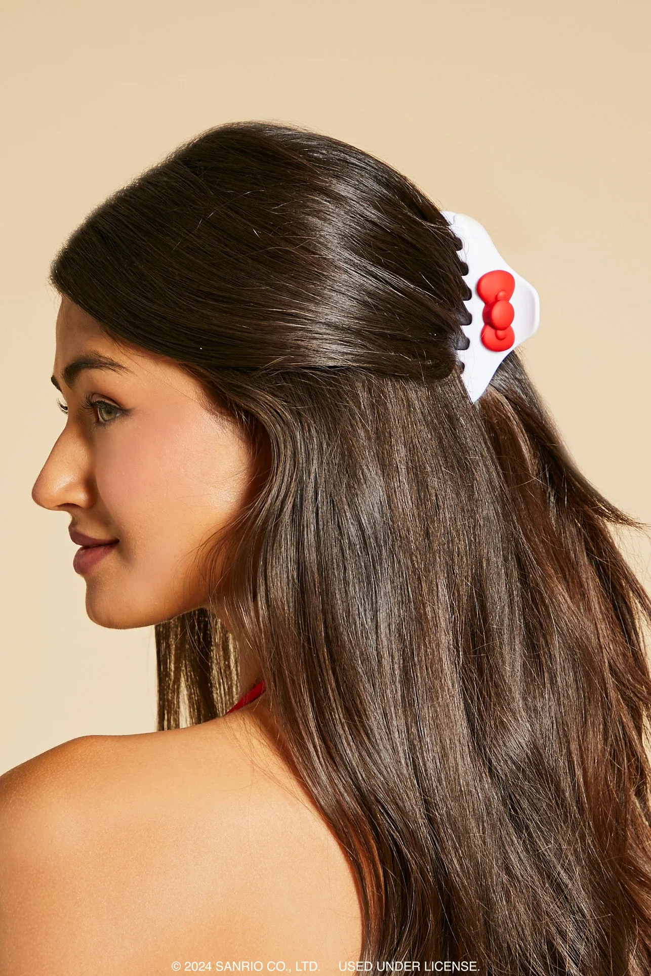 Hello Kitty Bow Claw Hair Clip sold by Urban Planet