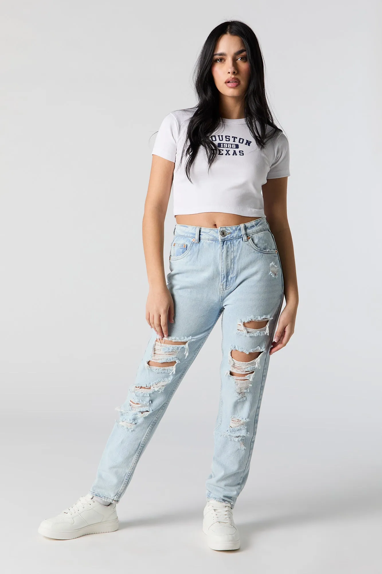 Light Wash Distressed High Rise Mom Jean sold by Urban Planet