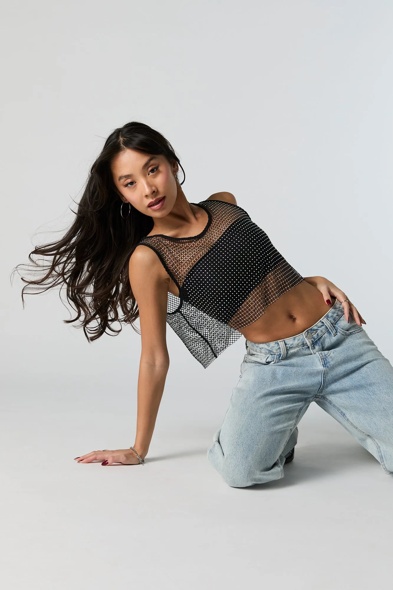 Fishnet Rhinestone Tank sold by Urban Planet