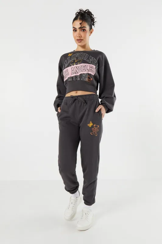 Graphic Drawstring Fleece Jogger sold by Urban Planet