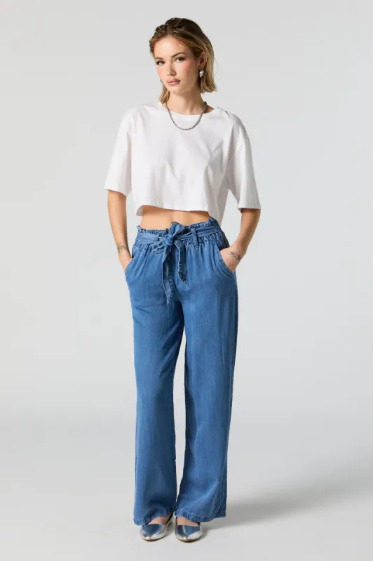 Jean à taille cintrée en denim délavé pâle sold by Urban Planet