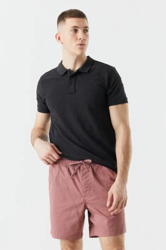 Short uni à taille élastique rose sold by Urban Planet