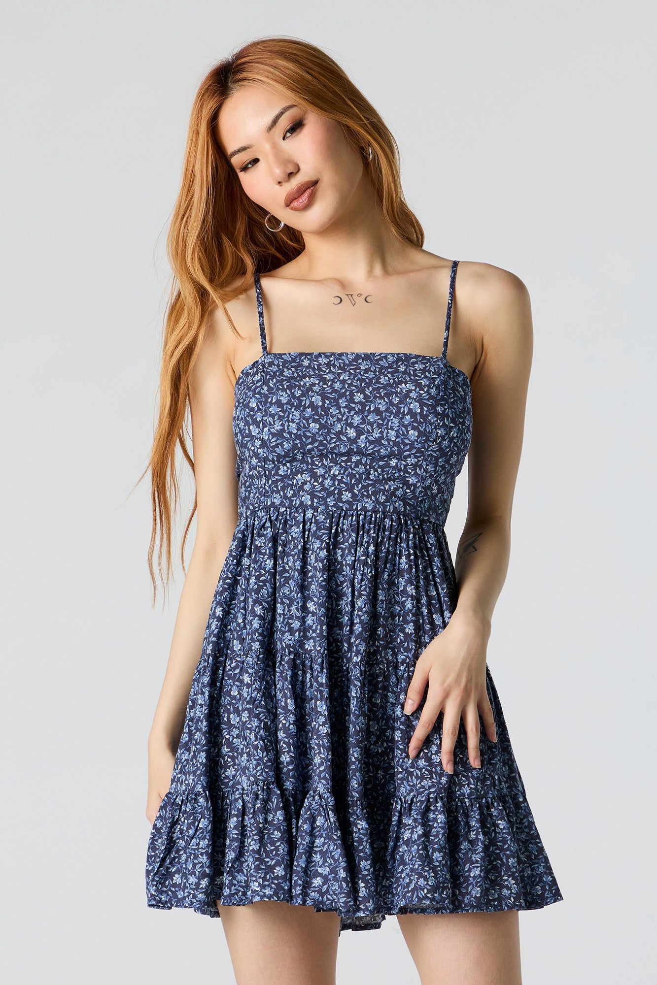Blue Floral Tiered Mini Dress with Built In Bra Cups sold by Urban Planet