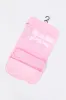Trousse de toilette suspendue sold by Urban Planet
