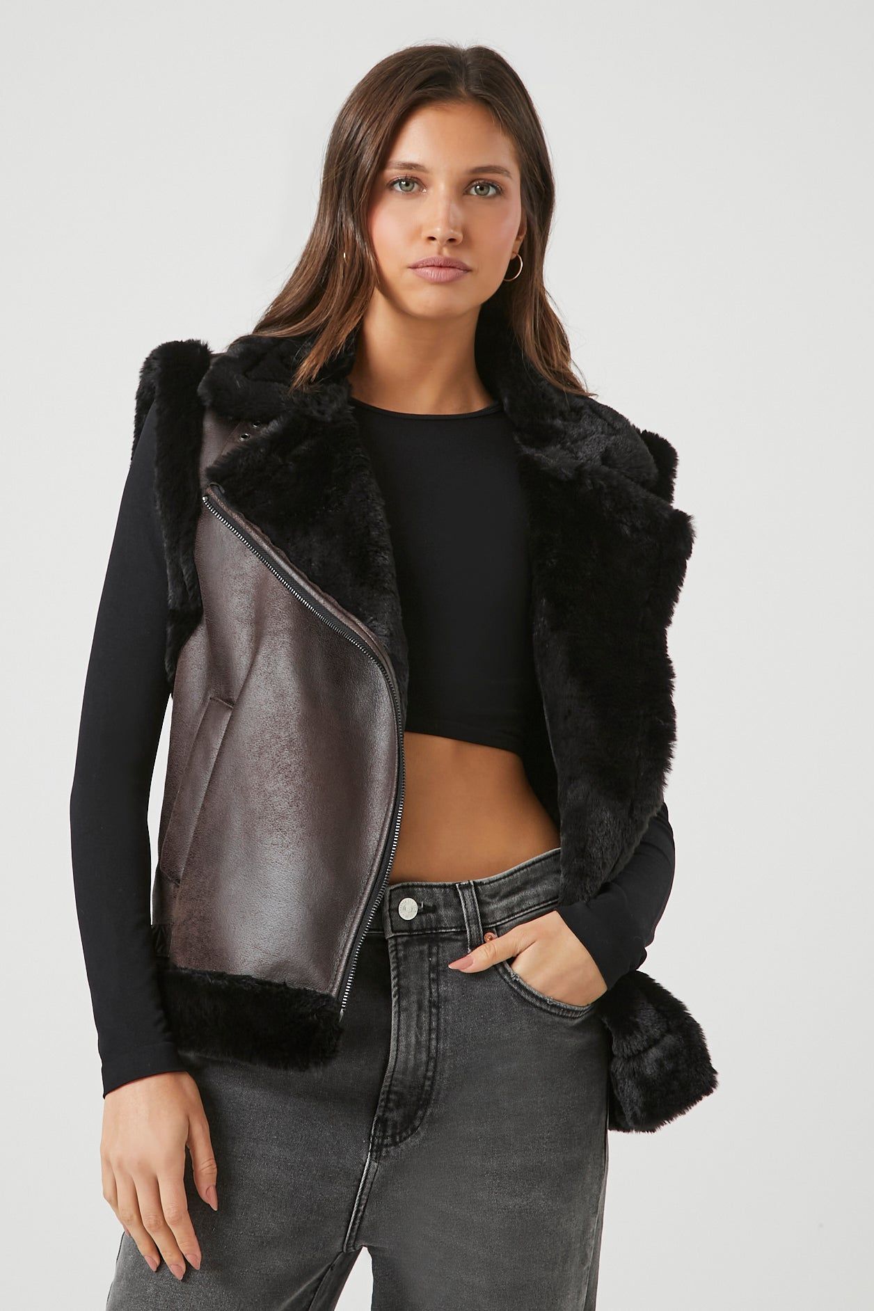 Faux Fur and Suede Vest sold by Urban Planet