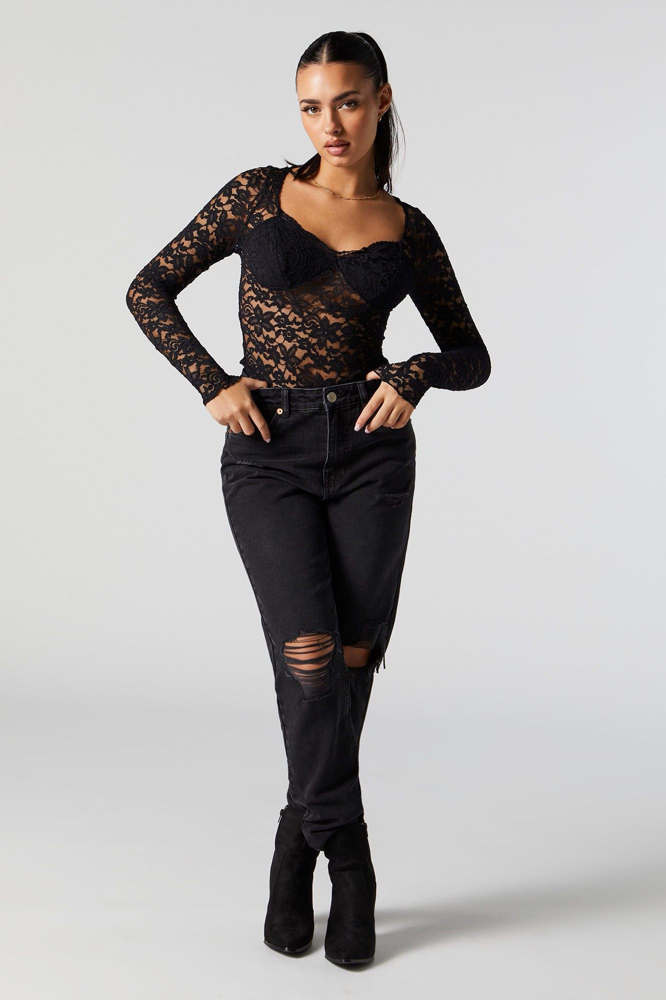 High Rise Black Wash Distressed Mom Jean sold by Urban Planet