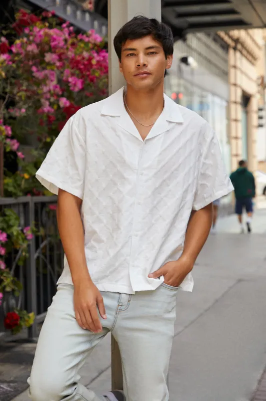 Textured Cropped Button-Up Top sold by Urban Planet