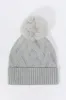Tuque en tricot torsadé sold by Urban Planet
