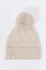 Tuque en tricot torsadé sold by Urban Planet