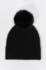 Tuque en tricot torsadé sold by Urban Planet