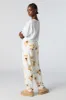 Pantalon de pyjama imprimé en peluche sold by Urban Planet