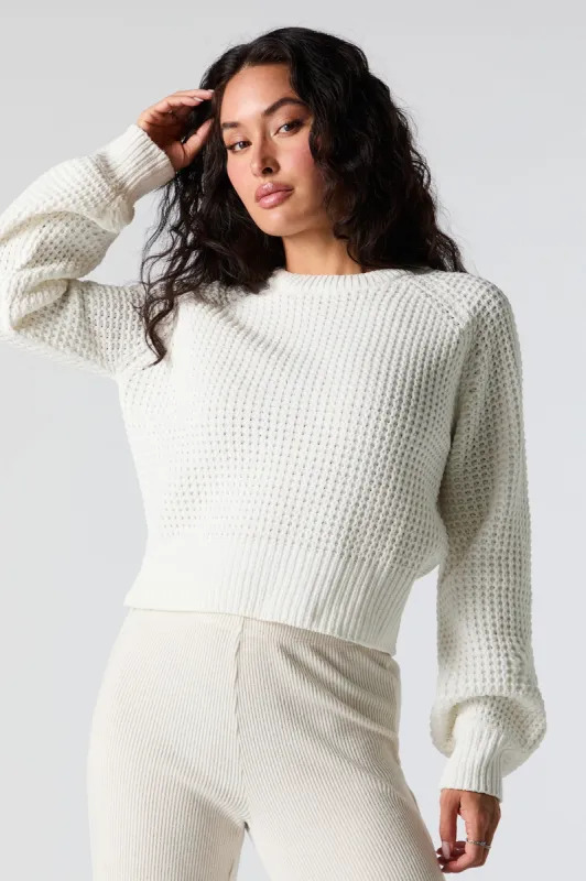 Chandail court en tricot gaufré sold by Urban Planet