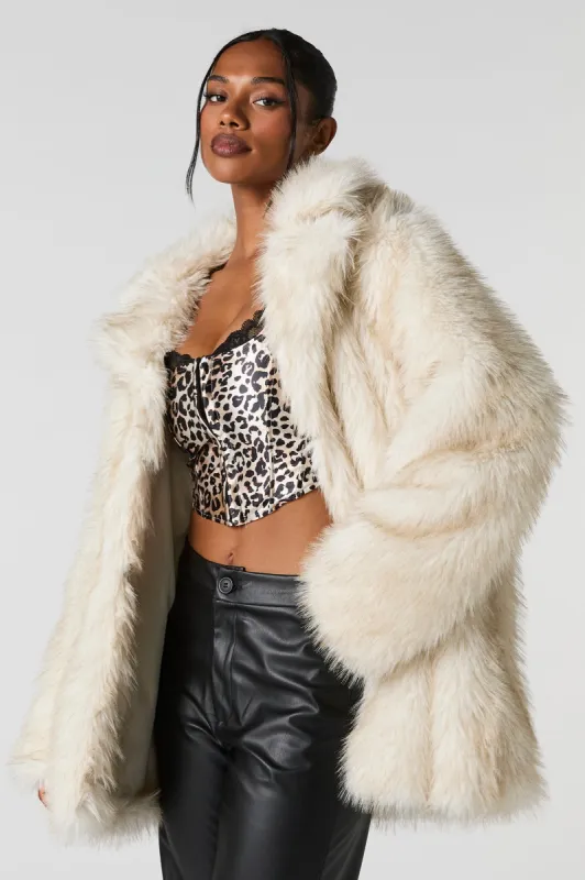 Blouson midi en similifourrure sold by Urban Planet