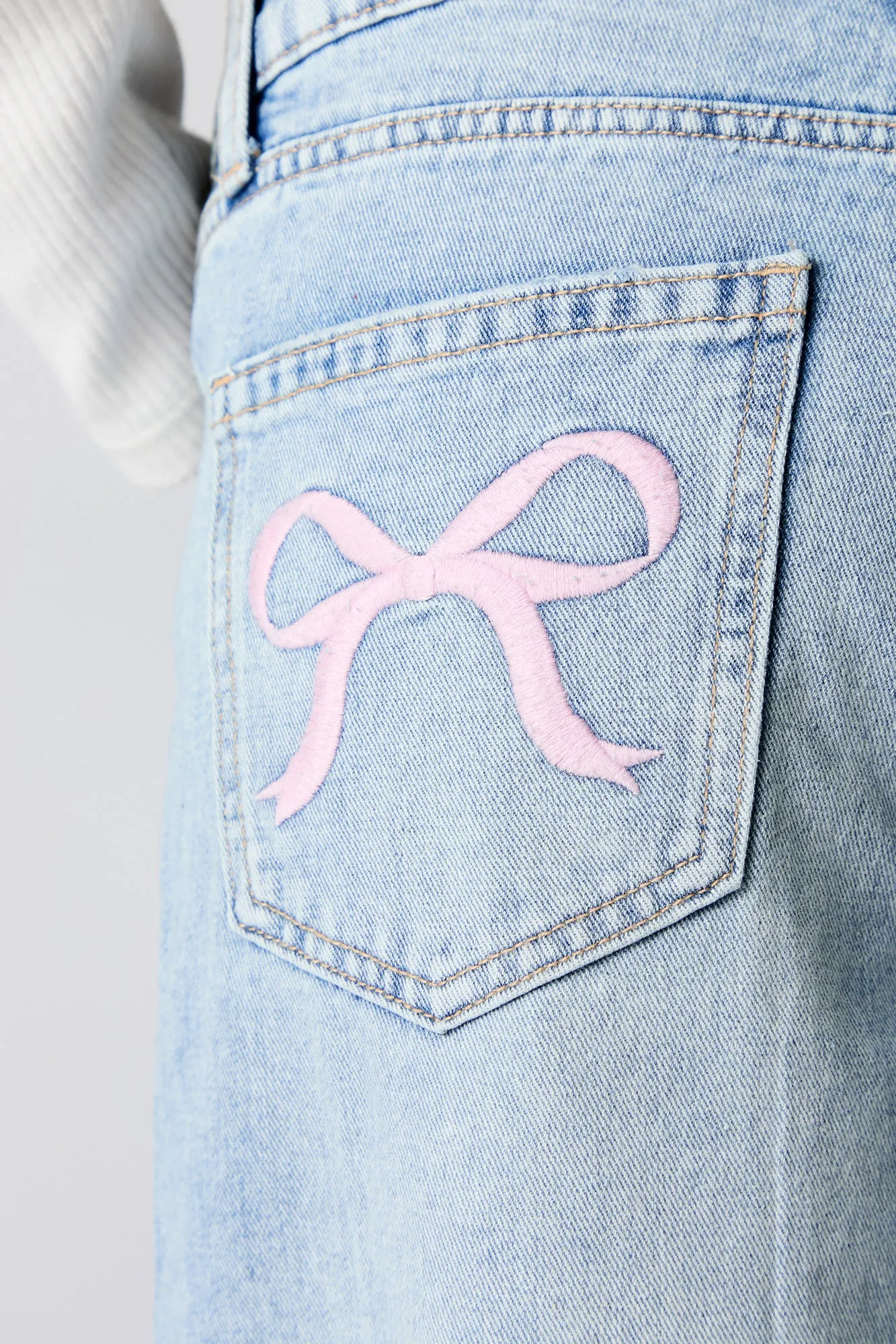 Embroidered Bow Pocket Skater Jean sold by Urban Planet