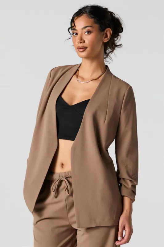 Blazer ouvert à manche froissée sold by Urban Planet