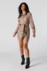 Minirobe à manches longues en similicuir avec ceinture sold by Urban Planet