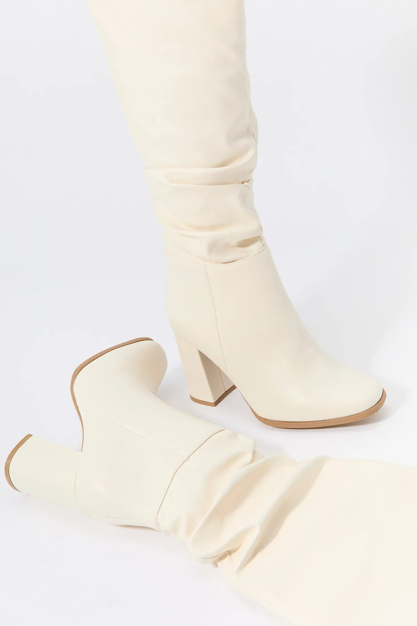 Faux Leather Slouchy Heeled Boot sold by Urban Planet