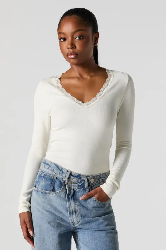 Maillot côtelé sans couture à manches longues avec liséré de dentelle sold by Urban Planet