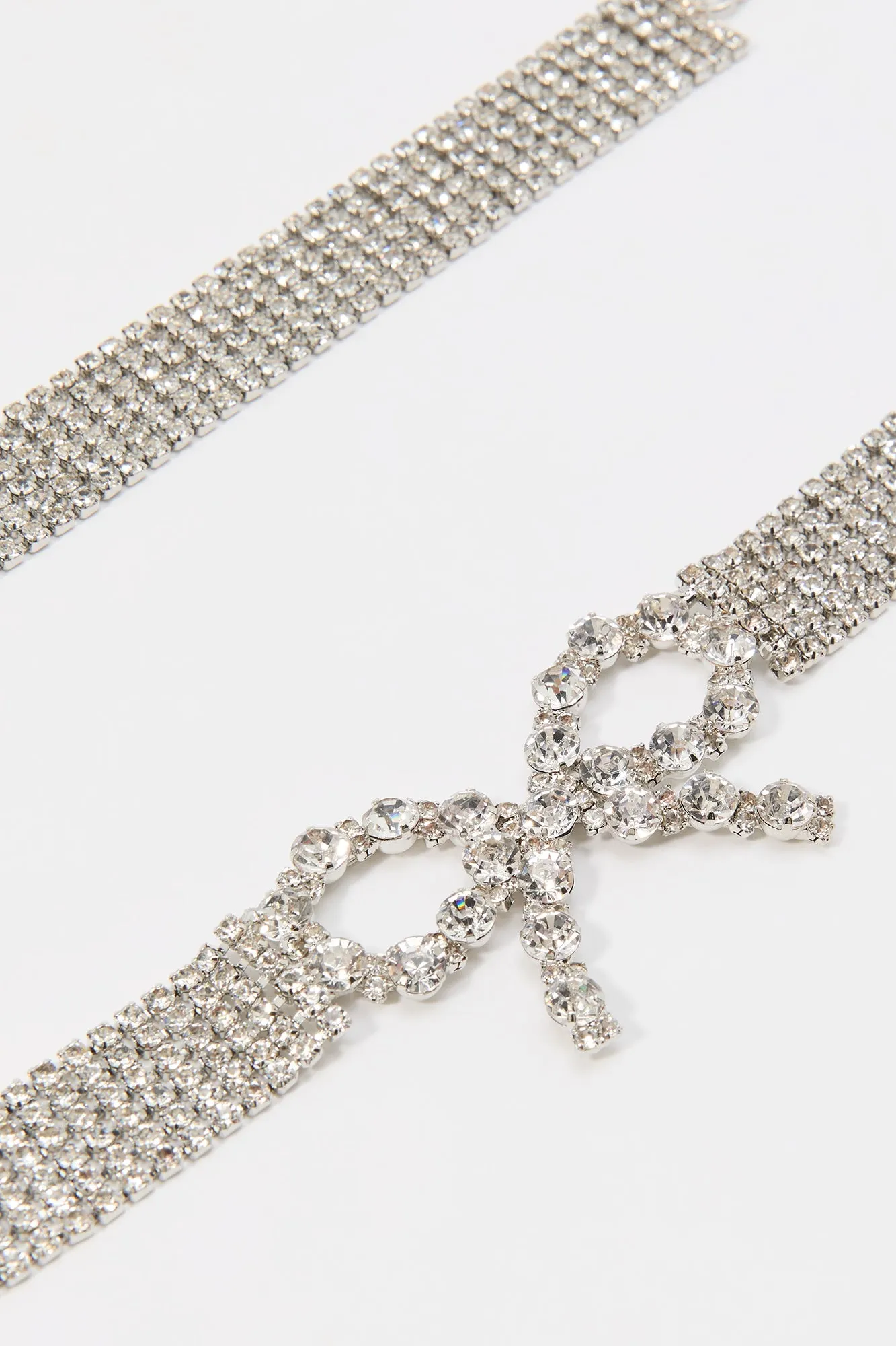 Rhinestone Bow Belt sold by Urban Planet