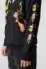 The Grinch & Max Graphic Fleece Hoodie sold by Urban Planet