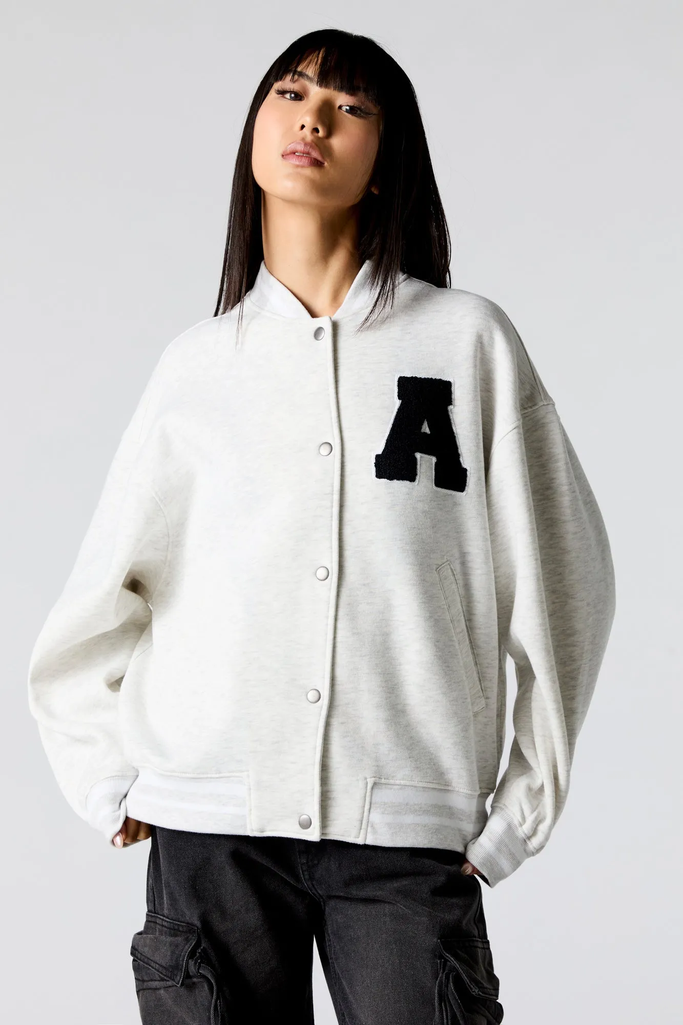 Embroidered Fleece Varsity Jacket sold by Urban Planet