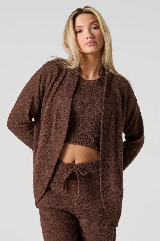 Cardigan boutonné en tricot pelucheux sold by Urban Planet