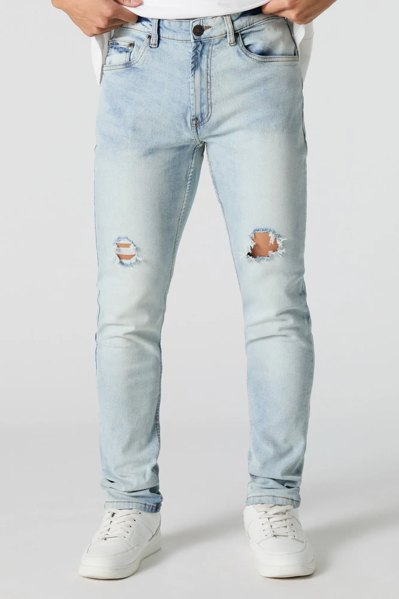 Light Wash Distressed Slim Jean sold by Urban Planet