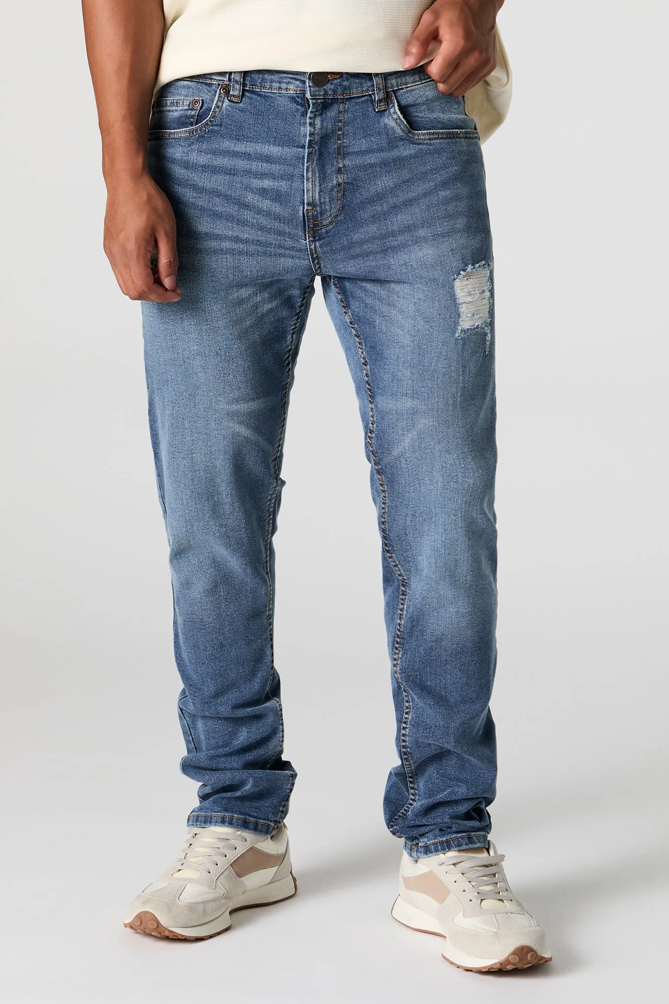 Medium Wash Distressed Slim Jean sold by Urban Planet