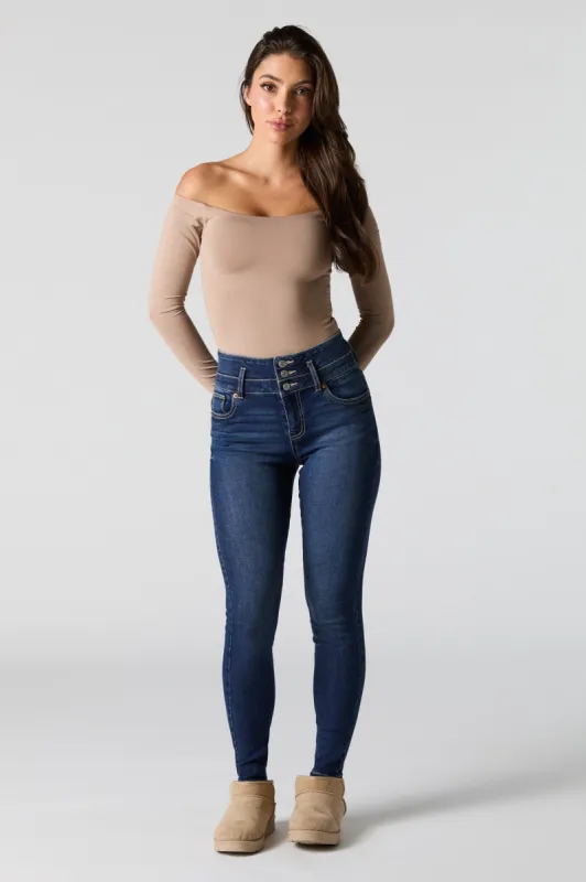 Jean ajusté extensible taille étagée délavé foncé sold by Urban Planet